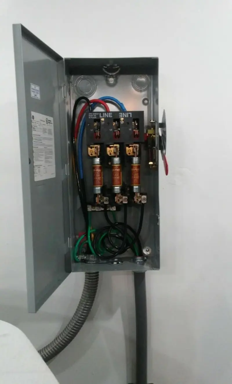 Three-phase disconnect switch installed for Smoke Detector Installation in Altamont